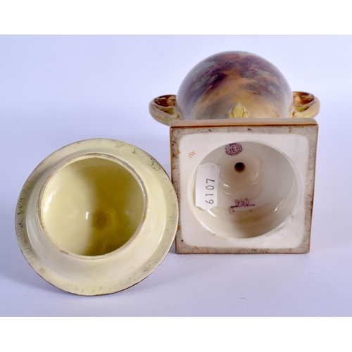 243 - A ROYAL WORCESTER TWIN HANDLED PORCELAIN VASE AND COVER by James Stinton, painted with highland catt... 