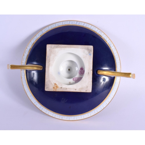 245 - A ROYAL WORCESTER TWIN HANDLED PORCELAIN COMPORT by Seabright. 19 cm wide.