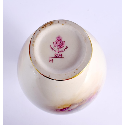 247 - A ROYAL WORCESTER PORCELAIN BULBOUS VASE by James Stinton. 21 cm x 8 cm.