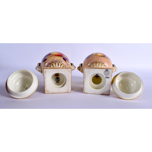 249 - A FINE PAIR OF TWIN HANDLED ROYAL WORCESTER VASES AND COVERS by Freeman, painted with fruit and berr... 