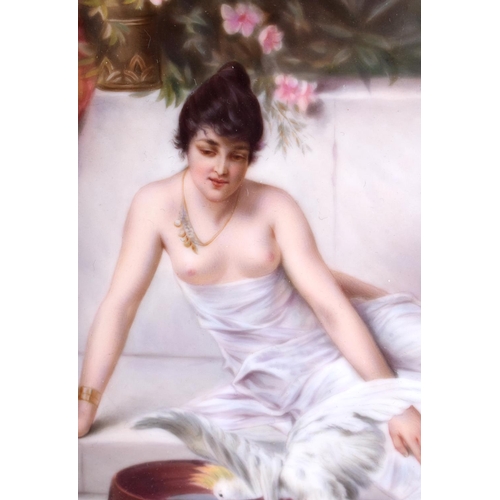25 - A LARGE EARLY 20TH CENTURY AUSTRIAN VIENNA PORCELAIN PLAQUE painted with semi clad nudes within an i... 