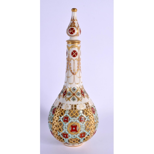 251 - AN AESTHETIC MOVEMENT RETICULATED ISLAMIC MARKET VASE AND COVER painted with jewelled motifs. 24 cm ... 