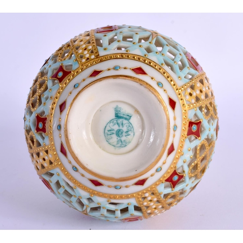 251 - AN AESTHETIC MOVEMENT RETICULATED ISLAMIC MARKET VASE AND COVER painted with jewelled motifs. 24 cm ... 