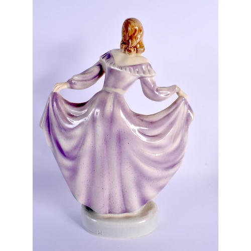 255 - AN ART DECO AUSTRIAN POTTERY FIGURE OF A FEMALE DANCER by Goldscheider. 30 cm x 18 cm.