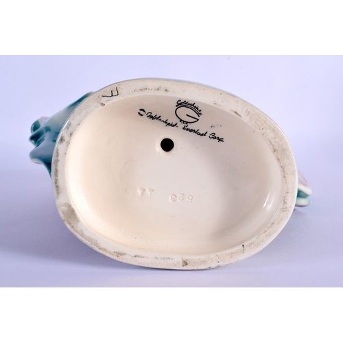 255 - AN ART DECO AUSTRIAN POTTERY FIGURE OF A FEMALE DANCER by Goldscheider. 30 cm x 18 cm.