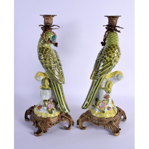 258 - A LARGE PAIR OF PORCELAIN PARROT CANDLESTICKS with French mounts. 36 cm high.