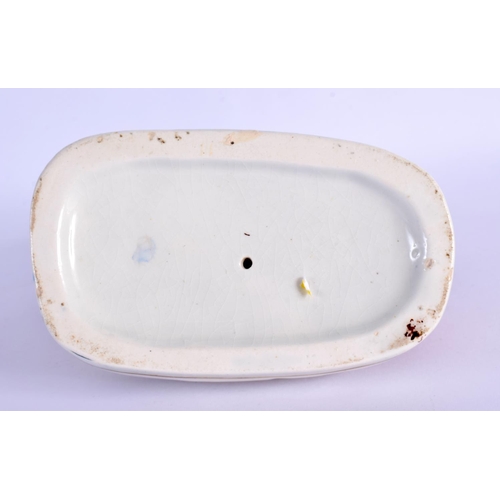 264 - AN UNUSUAL 19TH CENTURY STAFFORDSHIRE FIGURE modelled as a couple. 18 cm x 13 cm.