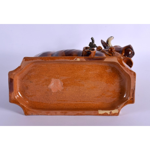 265 - A LARGE 19TH CENTURY EUROPEAN TREACLE GLAZED BULL DECANTER AND STOPPER. 25 cm x 18 cm.