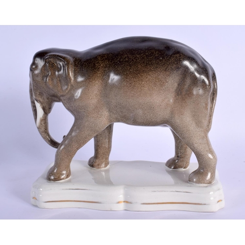 273 - A RARE 19TH CENTURY STAFFORDSHIRE FIGURE OF JUMBO THE ELEPHANT modelled roaming upon a shaped base. ... 