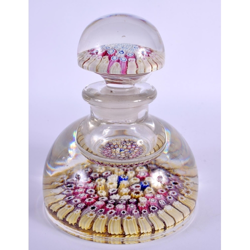 277 - A STROUBRIDGE GLASS INKWELL PAPERWEIGHT. 16 cm x 8 cm.