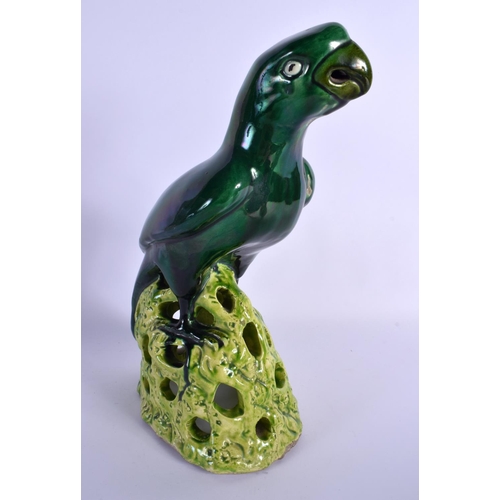 281 - A LARGE EARLY 20TH CENTURY CONTINENTAL POTTERY FIGURE OF A PARROT modelled upon a naturalistic stump... 
