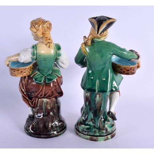 294 - A PAIR OF 19TH CENTURY MINTON MAJOLICA FIGURAL MATCH HOLDER  DISHES. 21 cm high.