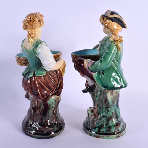 294 - A PAIR OF 19TH CENTURY MINTON MAJOLICA FIGURAL MATCH HOLDER  DISHES. 21 cm high.