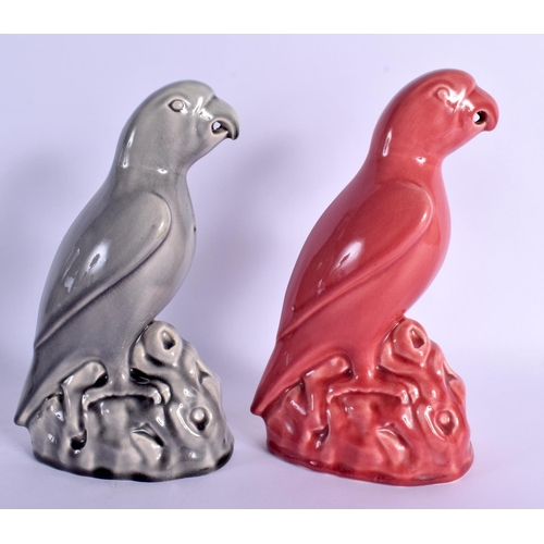 295 - A PAIR OF MINTONS POTTERY PARROTS. 23 cm high.