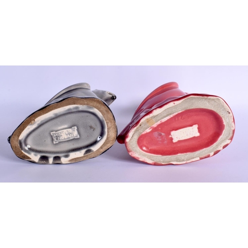 295 - A PAIR OF MINTONS POTTERY PARROTS. 23 cm high.