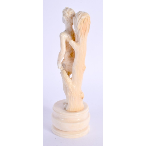 303 - A RARE 19TH CENTURY EUROPEAN IVORY FIGURE OF A STANDING MALE modelled shirtless and roaming. 12 cm h... 