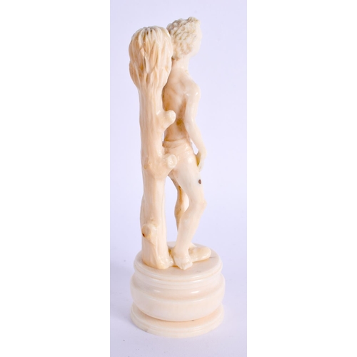 303 - A RARE 19TH CENTURY EUROPEAN IVORY FIGURE OF A STANDING MALE modelled shirtless and roaming. 12 cm h... 