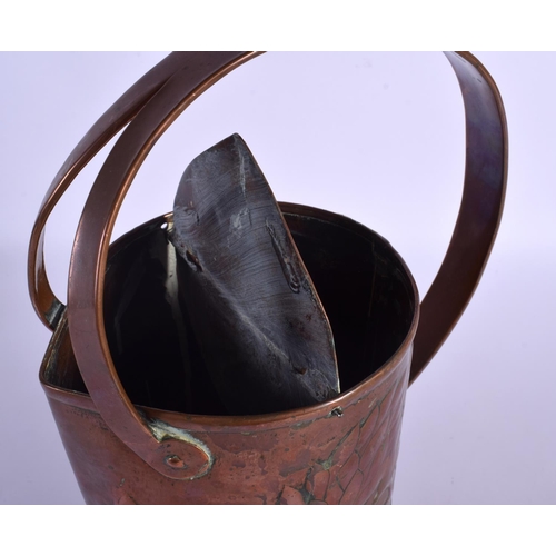 304 - AN ARTS AND CRAFTS COPPER JUG decorated in foliage. 34 cm x 18 cm.