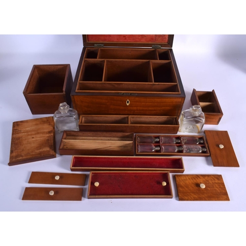 305 - A FINE EARLY VICTORIAN MAHOGANY AND SATINWOOD TRAVELLING VANITY BOX with fitted interior and scent b... 