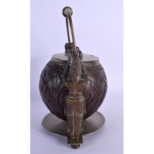 308 - A VERY RARE 19TH CENTURY INDIAN CARVED COCONUT SHELL BOWL AND COVER with two standing Buddhistic bro... 