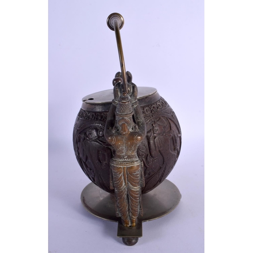 308 - A VERY RARE 19TH CENTURY INDIAN CARVED COCONUT SHELL BOWL AND COVER with two standing Buddhistic bro... 