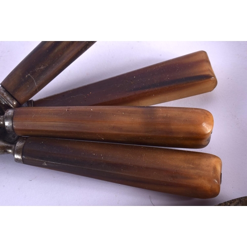 310 - A SUITE OF 19TH CENTURY CONTINENTAL CARVED RHINOCEROS HORN CUTLERY with steel mounts. (qty)