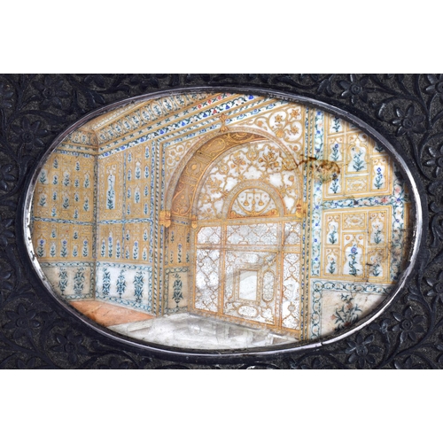 312 - A LARGE 19TH CENTURY INDIAN PAINTED IVORY MINIATURE encased within a hardwood frame. 26 cm x 20 cm.