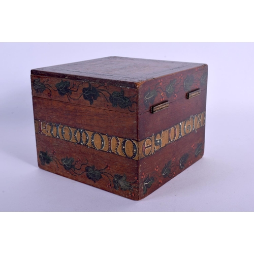 316 - A CHARMING ARTS AND CRAFTS CARVED AND PAINTED WOODEN CADDY painted with motifs and flowers. 12.5 cm ... 