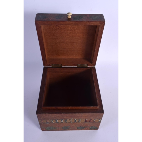 316 - A CHARMING ARTS AND CRAFTS CARVED AND PAINTED WOODEN CADDY painted with motifs and flowers. 12.5 cm ... 