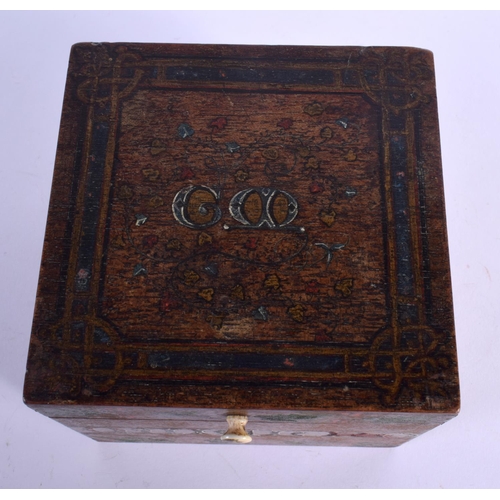 316 - A CHARMING ARTS AND CRAFTS CARVED AND PAINTED WOODEN CADDY painted with motifs and flowers. 12.5 cm ... 