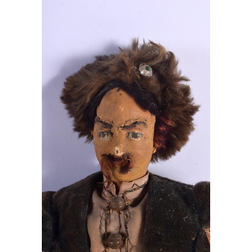 317 - AN EARLY 20TH CENTURY RUSSIAN DOLL modelled as a male peasant. 30 cm high.