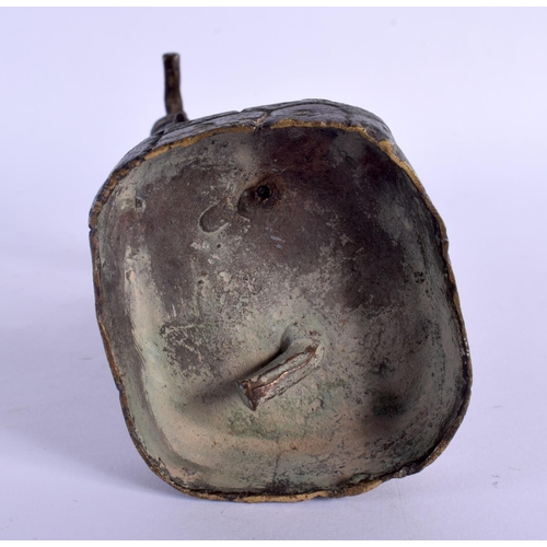 318 - AN 18TH/19TH CENTURY MIDDLE EASTERN BRONZE FIGURE OF A MALE modelled holding a teapot and staff. 24 ... 