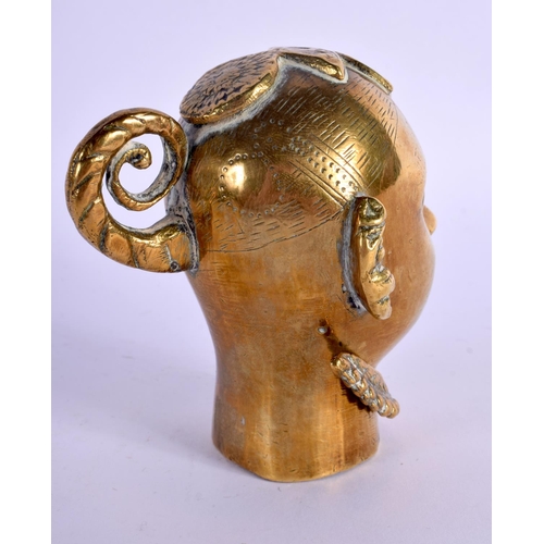323 - A 19TH CENTURY INDIAN BRONZE HINDU TYPE HEAD with a handle. 10 cm x 6 cm.