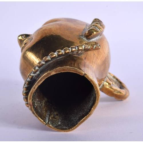 323 - A 19TH CENTURY INDIAN BRONZE HINDU TYPE HEAD with a handle. 10 cm x 6 cm.