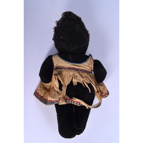 325 - AN EARLY 20TH CENTURY ENGLISH PLUSH DOLL modelled in Ethnic clothing. 33 cm high.