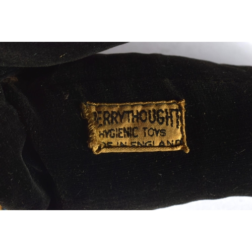 325 - AN EARLY 20TH CENTURY ENGLISH PLUSH DOLL modelled in Ethnic clothing. 33 cm high.