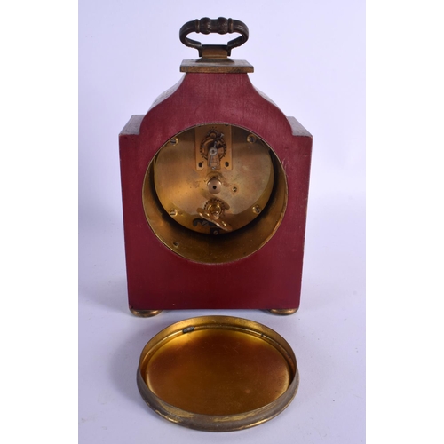 327 - A GEORGE III STYLE COUNTRY HOUSE RED LACQUER MANTEL CLOCK decorated with figures. 21 cm x 11 cm inc ... 