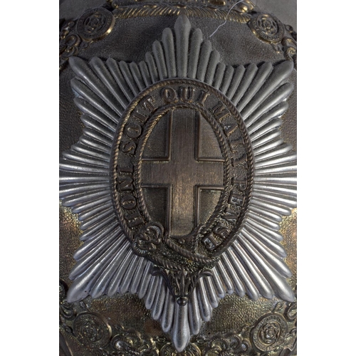 328 - A FIRMIN AND SONS ENGLISH METAL HOUSEHOLD CAVALRY HELMET upon a stand. Height from chin to top of pl... 