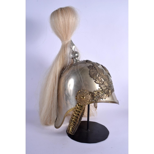 328 - A FIRMIN AND SONS ENGLISH METAL HOUSEHOLD CAVALRY HELMET upon a stand. Height from chin to top of pl... 