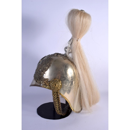 328 - A FIRMIN AND SONS ENGLISH METAL HOUSEHOLD CAVALRY HELMET upon a stand. Height from chin to top of pl... 