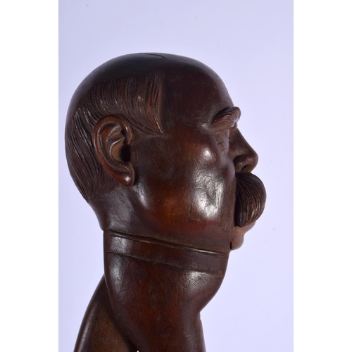 334 - A PAIR OF ANTIQUE BAVARIAN BLACK FOREST NUT CRACKERS. 21 cm x 7 cm.