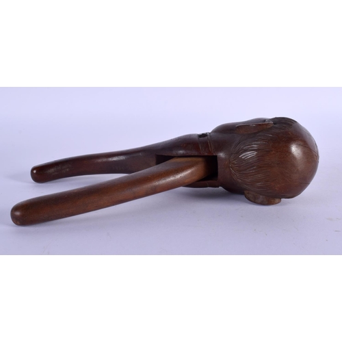 334 - A PAIR OF ANTIQUE BAVARIAN BLACK FOREST NUT CRACKERS. 21 cm x 7 cm.