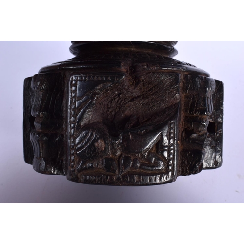 339 - A RARE NEAR PAIR OF 17TH/18TH CENTURY INDIAN CARVED WOOD MORTARS carved with Buddhistic figures. Lar... 