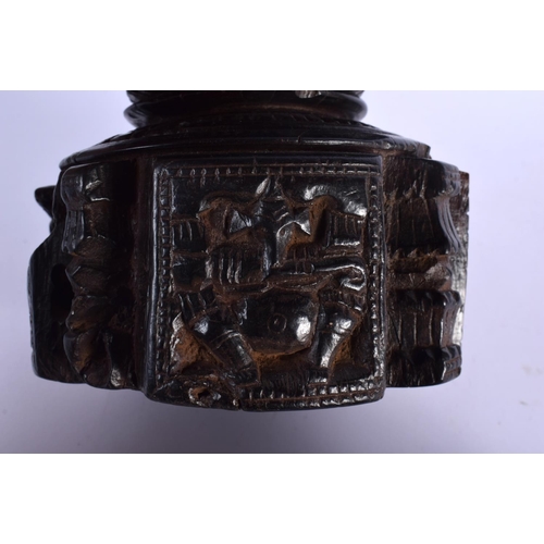 339 - A RARE NEAR PAIR OF 17TH/18TH CENTURY INDIAN CARVED WOOD MORTARS carved with Buddhistic figures. Lar... 