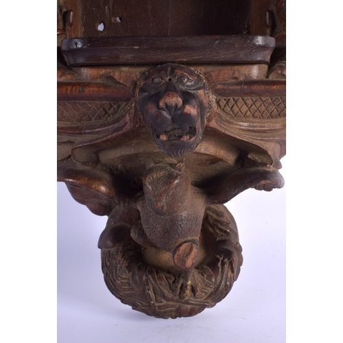 341 - AN UNUSUAL ANTIQUE BLACK FOREST TYPE HANGING WALL FONT STYLE STAND formed with owls and birds. 50 cm... 