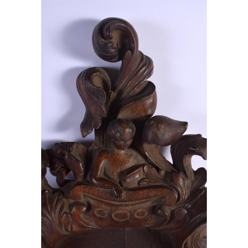 341 - AN UNUSUAL ANTIQUE BLACK FOREST TYPE HANGING WALL FONT STYLE STAND formed with owls and birds. 50 cm... 