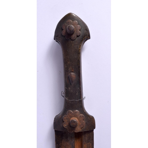 343 - A LARGE 19TH CENTURY CONTINENTAL CARVED RHINOCEROS HORN HANDLED KNIFE decorated with stud work flowe... 