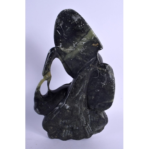 348 - AN EARLY 20TH CENTURY CONTINENTAL JADE TYPE STONE MOUNTAIN GROUP formed with animals. 24 cm x 12 cm.