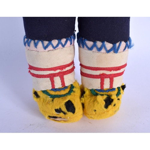 350 - A VERY UNUSUAL EARLY 20TH CENTURY NORTH AMERICAN INUIT STONE HEAD DOLL with original clothing. 27 cm... 