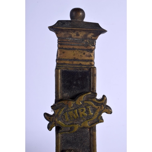 352 - A 19TH CENTURY EUROPEAN BRONZE AND WOOD CORPUS CHRISTI overlaid with skulls. 45 cm x 17 cm.